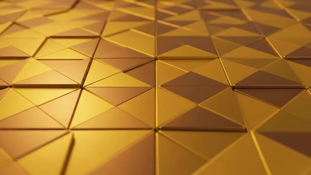Golden 3D geometric pattern featuring triangular shapes arranged in a repeating design, creating a visually appealing texture with metallic gold tiles.