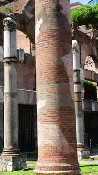 another roman forum colonnaded ruins tall columns mixed materials massive brick arches varied textures palimpsest character reflect adaptation foro di cesare view rome italy empire emperor 