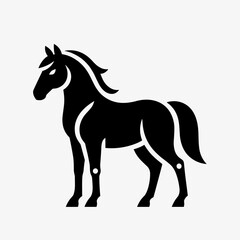 Obraz premium Striking black silhouette of a majestic horse standing proudly, depicted in a clean, graphic style.