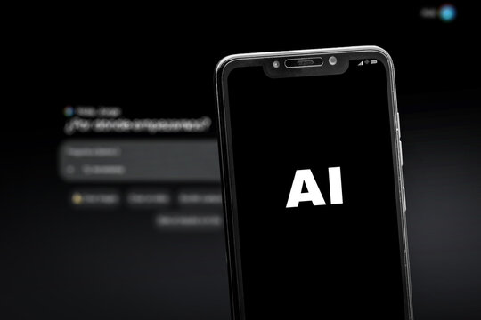 Representation of artificial intelligence with a smartphone and behind it an LLM on the computer screen