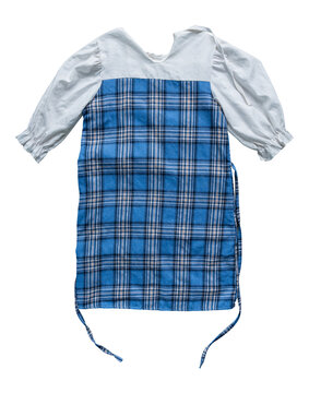 Blue plaid dress with white sleeves isolated on transparent background, casual fashion apparel.