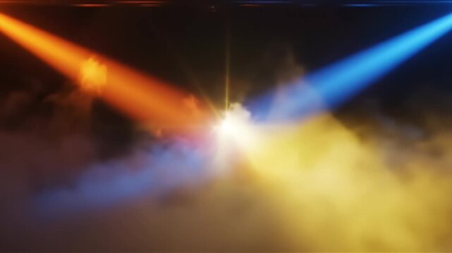 Dynamic stage lighting with vibrant orange and blue spotlights converging in a smoky atmosphere creating a dramatic and energetic visual effect for events or music videos