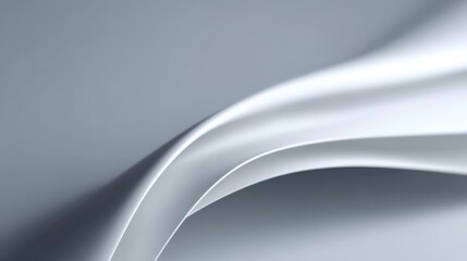 Elegant Flowing White Fabric Textile with Soft Curves and Light Shadows Creating a Minimalist Aesthetic for Design and Background Use