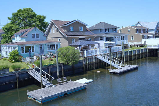 waterfront homes with boat docks provide easy access to water recreation