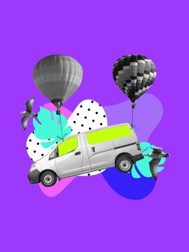 a van carried away by balloons