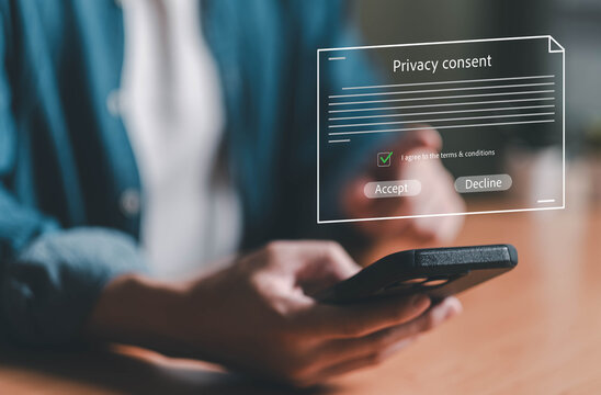 Close up shot of people using smartphone and laptop decided to accept or decline to share Privacy Consent of their personal data. Customer data privacy when access online website. GDPR compliance.
