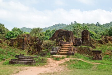 Ancient temple ruins hidden deep within a remote jungle area, shrouded in mystery. My Son, Vietnam.