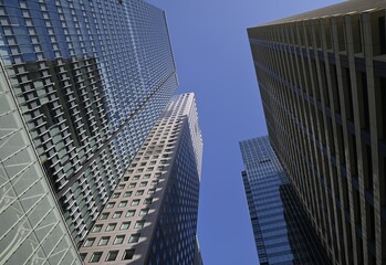 Fototapeta premium Modern skyscrapers at the Tōkyō Kokusai Fōramu (Tokyo International Forum) a multi-purpose culture center in Marunouchi Chiyoda, Tokyo Japan.