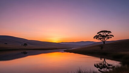 Obraz premium Scenic landscape mirroring at sunrise, calm water reflects vibrant colors, nature's beauty in peaceful ambiance. Minimalist photography.