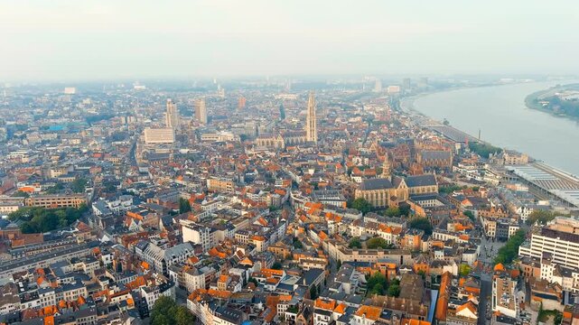 Antwerp, Belgium. Panorama overlooking the Cathedral of Our Lady (Antwerp). Historical center of Antwerp. City is located on the river Scheldt (Escaut). Summer morning. Drone footage