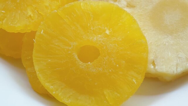 Candied pineapple on a plate.