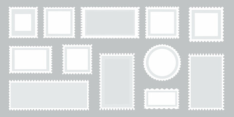 Collection of empty rectangular and oval photo frames on a gray background