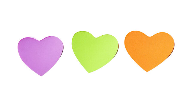 Row of colorful heart shaped sticky notes on transparent squared background