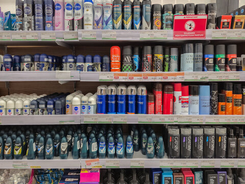 ​Men's deodorant and body spray products displayed on supermarket shelves. Variety of grooming brands in a retail store pharmacy section for male personal care and hygiene