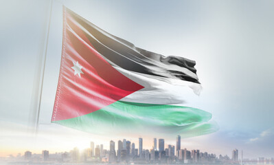 Jordan flag waving with modern futuristic buildings. Jordan national flag beautifully waving in the sky. © Muhammad Arif