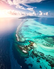 Aerial view of a tropical island with turquoise waters and coral reefs