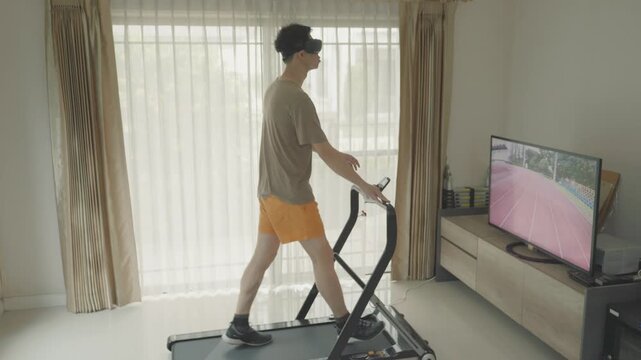 A person engaged in a home exercise routine on a treadmill while watching a sports program on a television, promoting fitness and an active lifestyle.