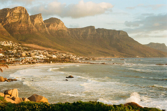 Sunset view of mountains and beach at Camps Bay, Cape Town