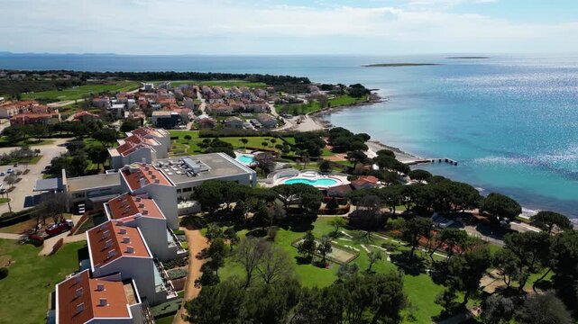 Aerial drone view of beautiful Medulin city in Istria, Croatia. Amazing sea side photo of tourist attraction Medulin near Pula, Croatia