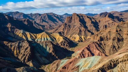 Aerial View of Mountainous Landscape with Colorful Terrain.