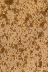 sunflower oil stains on food packaging paper after the paper contained crispy potato chips that were deep fried