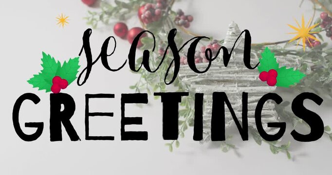 Animation of seasons greetings text banner with mistletoe icon over star christmas decorations