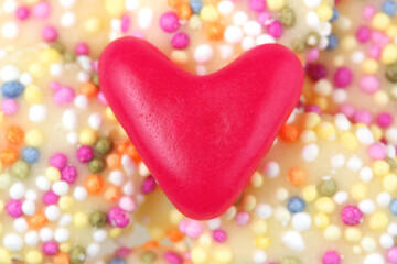Obraz premium Red love heart sweet closeup with colourful little balls