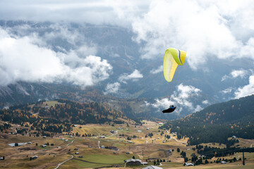 A paragliding sport at seceda peak dolomite italy