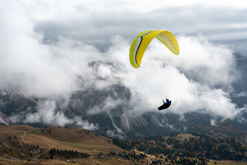 A paragliding sport at seceda peak dolomite italy