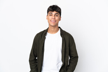 Young man over isolated white background laughing