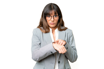 Young caucasian woman over isolated chroma key background making the gesture of being late