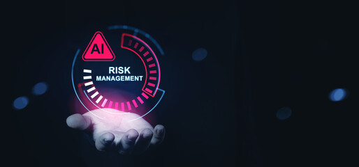 Futuristic concept of AI-based risk management with digital HUD interface hovering above a human hand on dark background, representing technology control.
