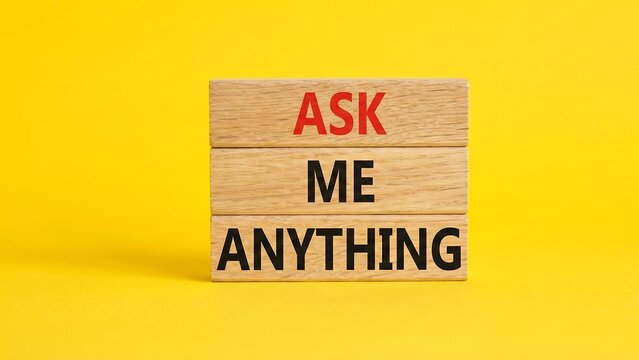 Question symbol. Concept words Ask me Anything on wooden blocks. Beautiful yellow background. new