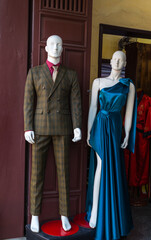 Fashion storefront display with male and female mannequins