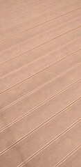 a close up of a wooden deck with brown lines.wood Background texture 