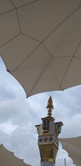 a view of a large group of umbrellas with the blue sky on background. Sky and cloud photography