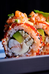 Gourmet Uramaki Sushi Roll with Eeel, Prawn, and Red Tobiko