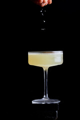 A professional shot of a Classic Margarita cocktail served in a traditional salt-rimmed glass