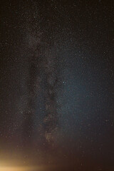 Obraz premium Milky Way Galaxy in Starry Night Sky Vertical Background