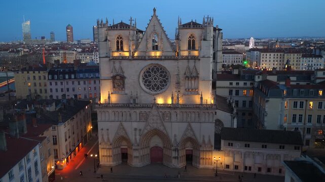 Lyon Cathedral night drone view, night illumination of the Cathedral of Saint John the Baptist of Lyon, historic medieval cathedral in Lyon