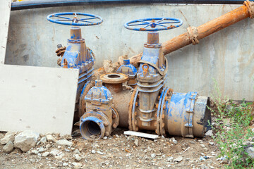 old gas valves on the ground