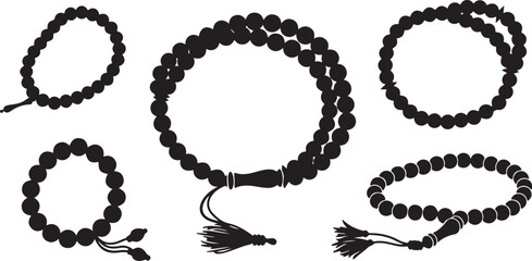 Obraz premium Black Beaded Necklaces and Bracelets with Tassels Displayed