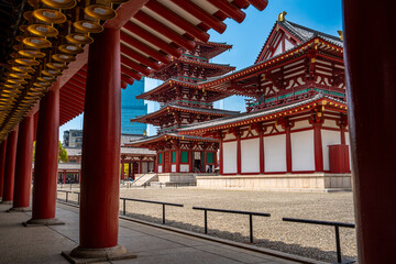 Shitennō-ji Buddhist temple, Osaka, Japan. Famous buddhist temple with a five story pagoda, statues and japanese zen garden, first built in 593 d.C.