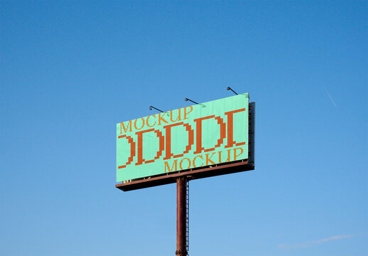 blank billboard standing tall with a clear blue sky. PSD mockup