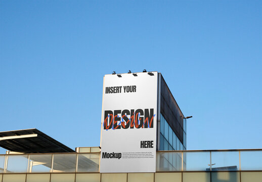 Mockup from real photo of Building storefront vertical billboard With Clear Sky
