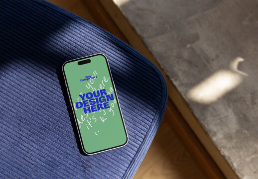Mockup from real photo of A Smartphone Sits on a Blue Chair