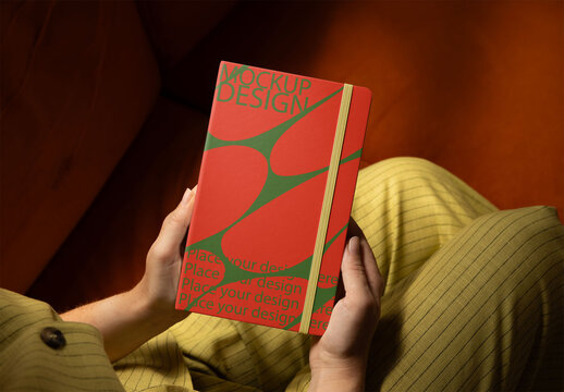 Mockup from real photo of front cover Notebook Held by woman