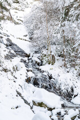 Snowy landscape of mountains port of Canencia in Madrid, Spain
