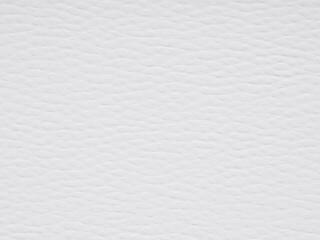 Fototapeta premium Gentle ripples of texture grace this white paper, suggesting quietude and a soft, tactile world