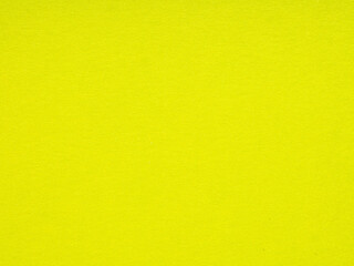 Obraz premium Bathed in the zest of a lemon hue, this textured paper brings an instant jolt of cheer and vibrancy